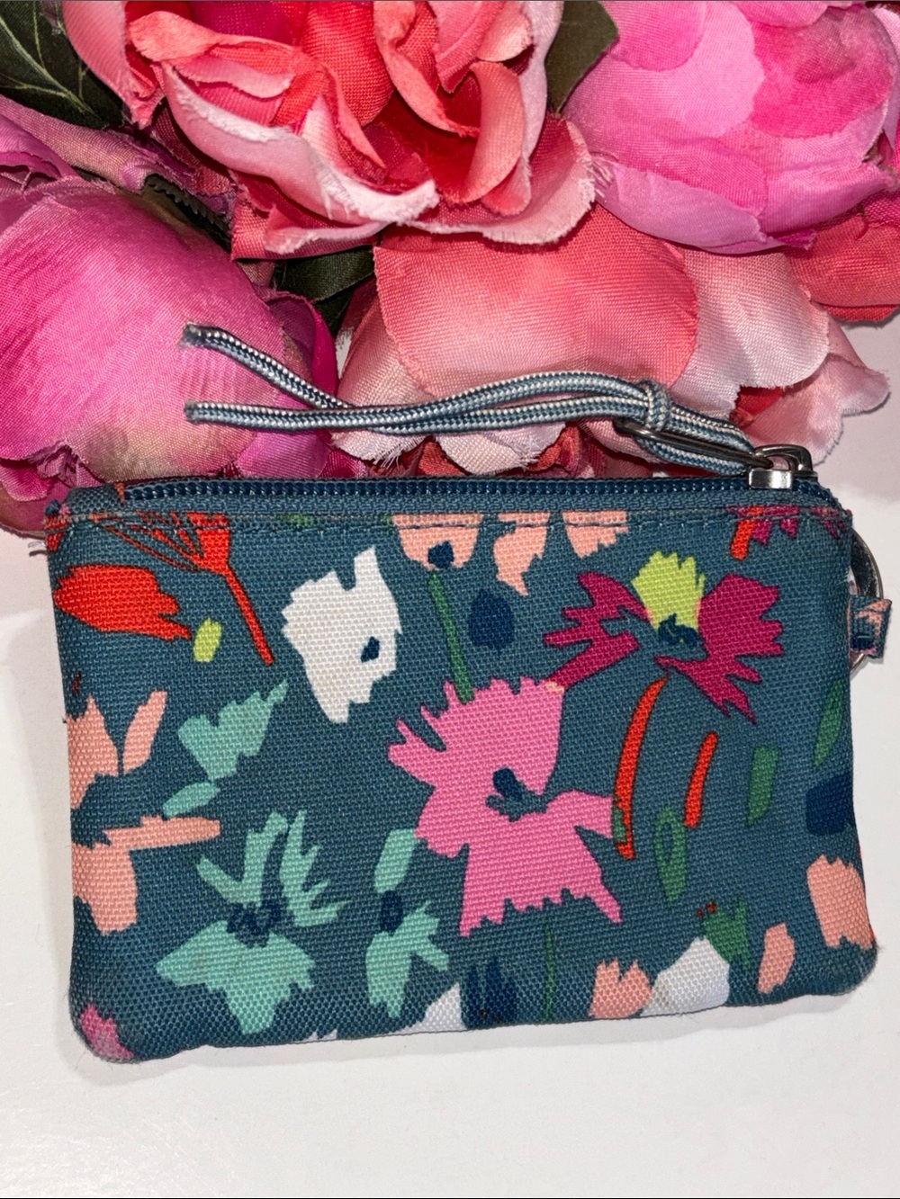 Vera Bradley Lighten Up Zip ID Case in a colorful blue-based floral pattern
